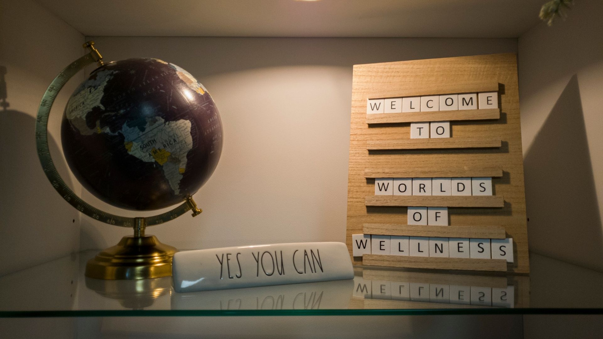 globe and welcome sign